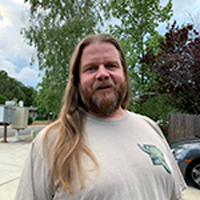 image of man with long hair and beard