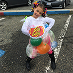 Image of girl dressed in Jelly Bean halloween costume