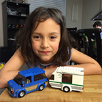 Image of young girl with legos