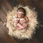 Image of infant baby in a basket