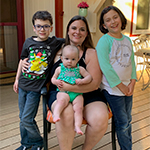 Image of mother with 3 children