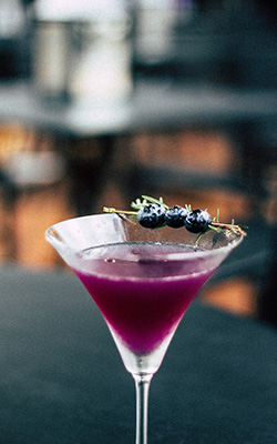 Pink drink on martini glass