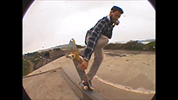 Author performing a Backside BluntMuteSlide in an abandoned park in San Francisco, CA in 2017