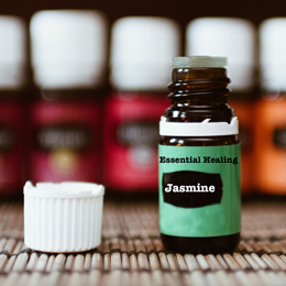 jasmine green essential oil bottle with cap off