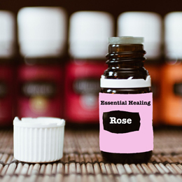 rose pink essential oil bottle with cap off