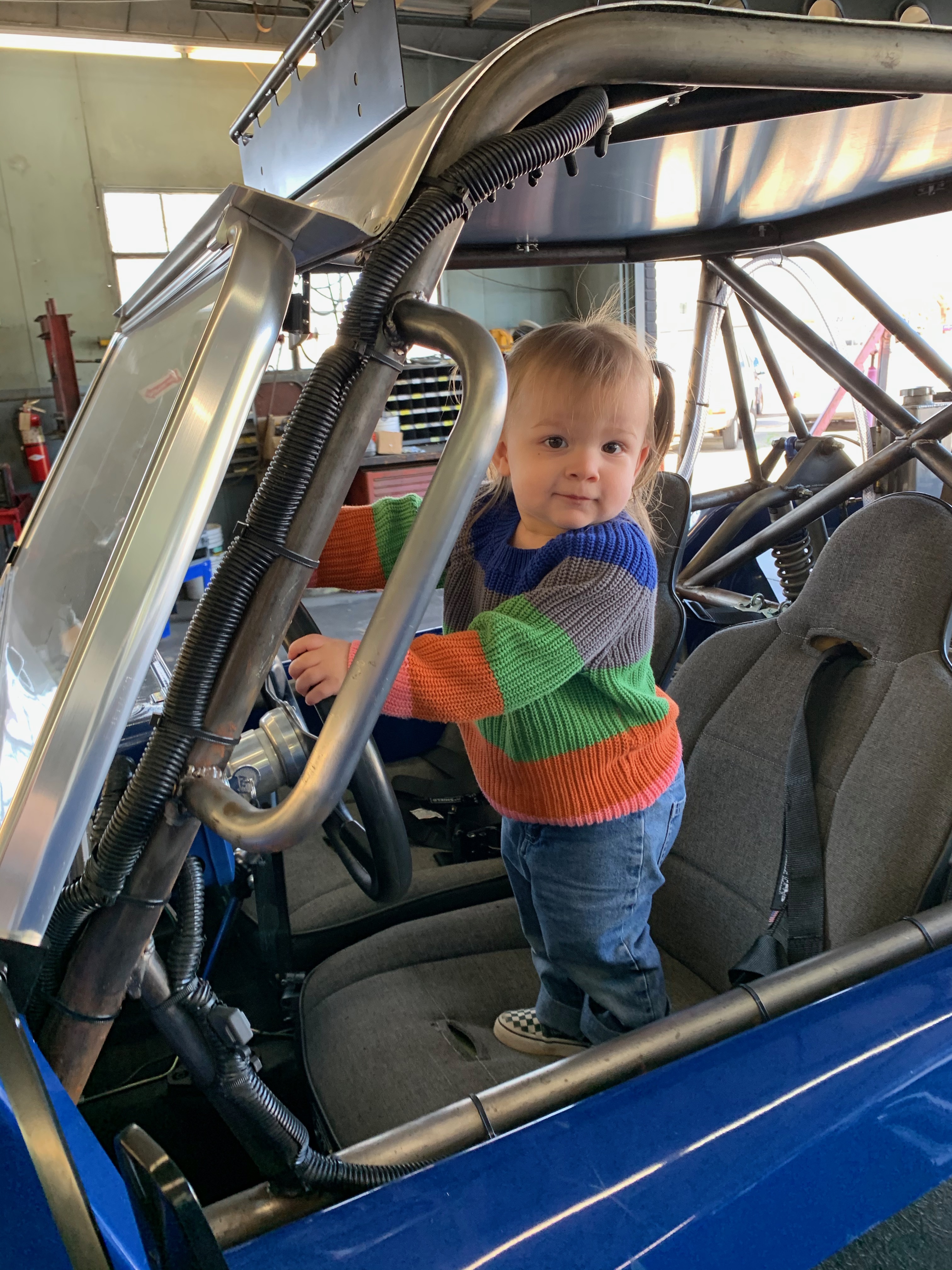 baby in dune buggy