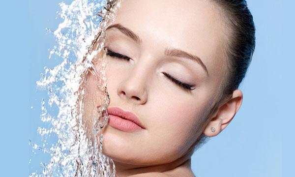 woman with water on face