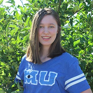 A self-portrait photo of the artist, Rylie Hayes.