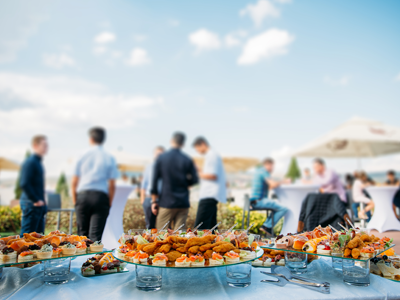 food laid on table at rooftop event