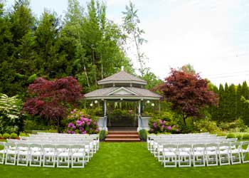 outdoor wedding set in a garden and a pagoda