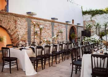 outdoor tables set in a rustic setting