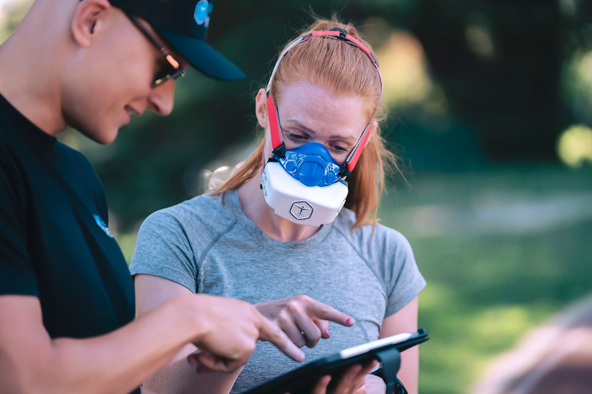 coaching explaining data to a female athlete