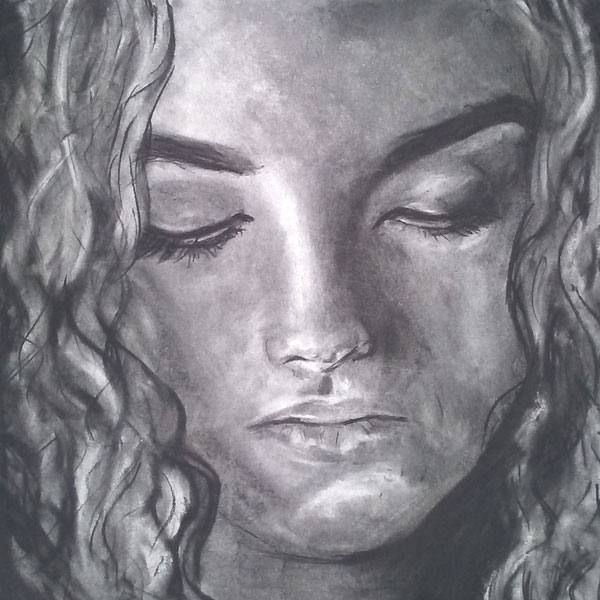 charcoal closeup portrait of a woman looking down.