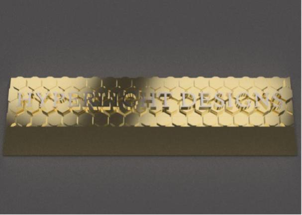 This is a gold bar that we designed with a 3D version of our logo on top.